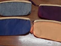 Pochettes, trousses de toilette et accessoires